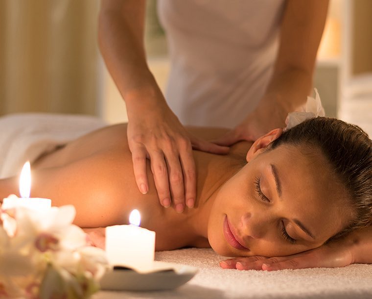 A woman getting a neck massage 