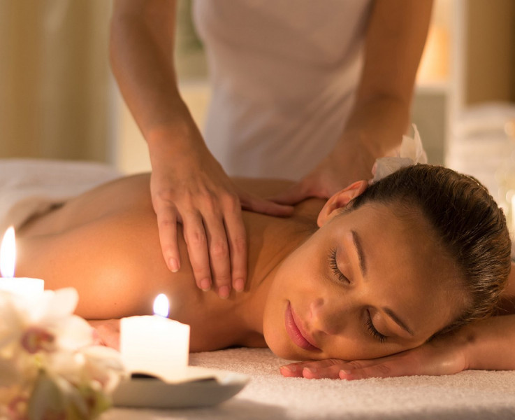 A woman getting a neck massage 
