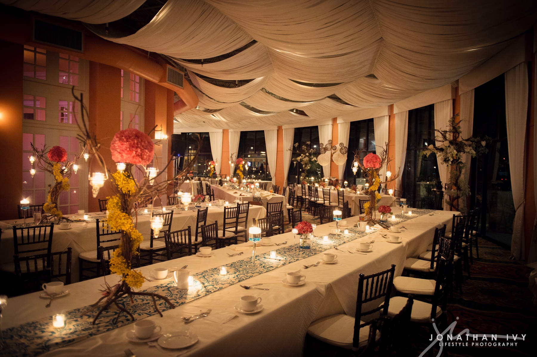 Dinner setup with large windows at the Veranda